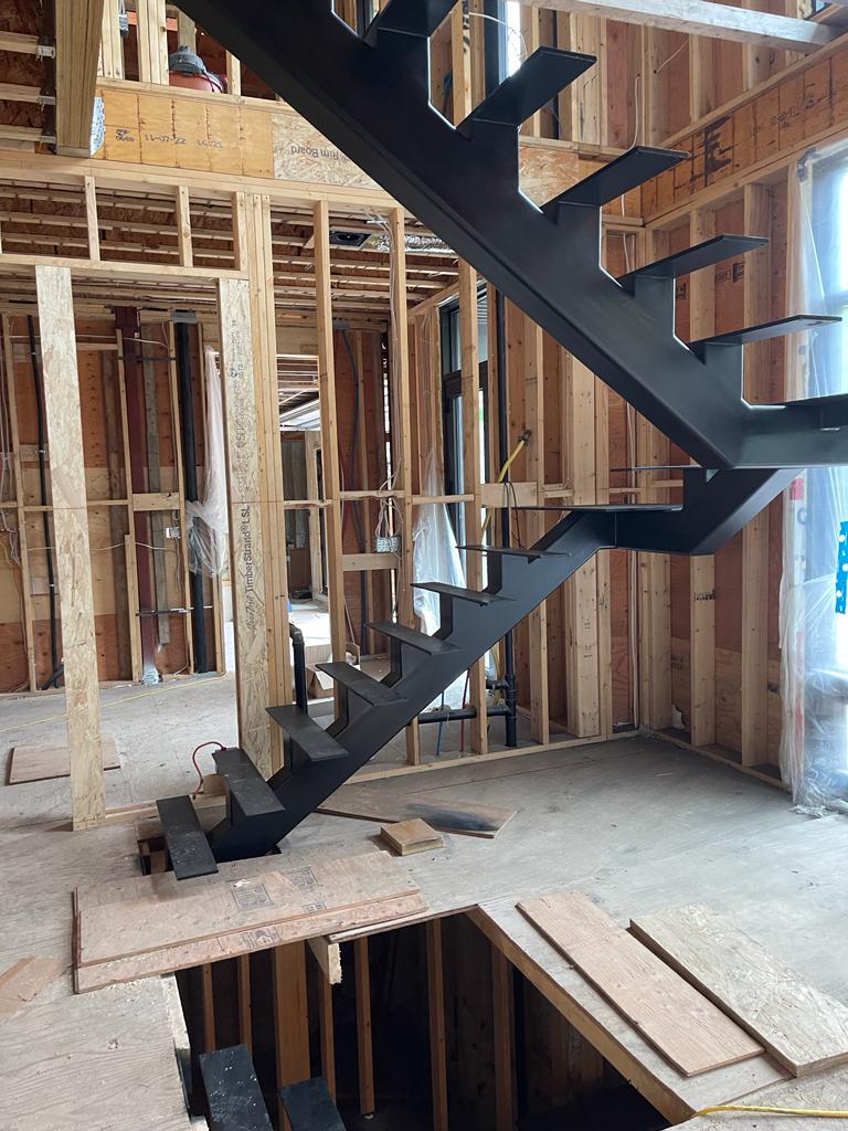 Custom iron railings and stairsinstalled in Toronto home Custom iron railings and stairs installed in Toronto home