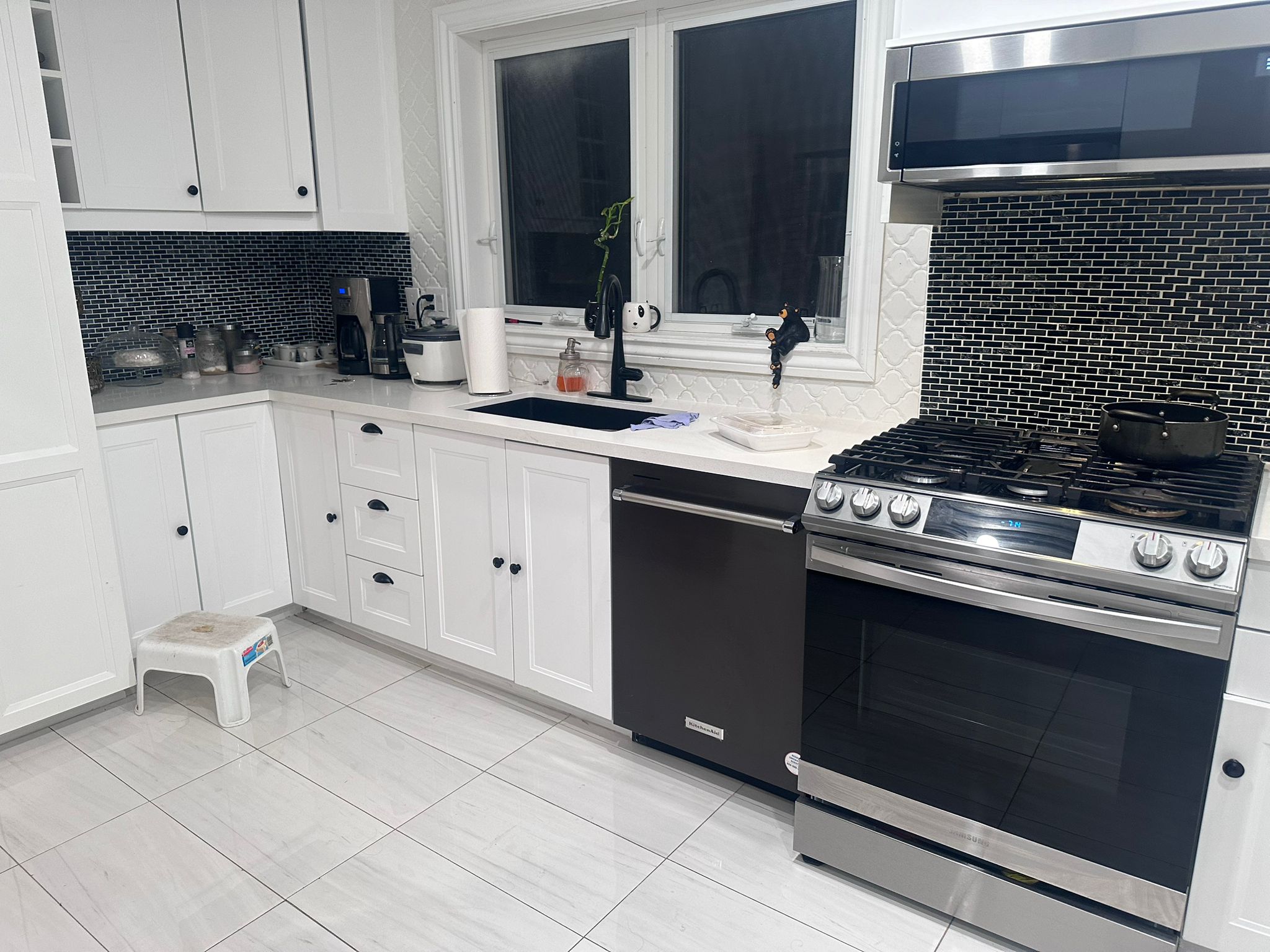 A bright and modern kitchen remodel completed by International Serie's Group's home renovation services team